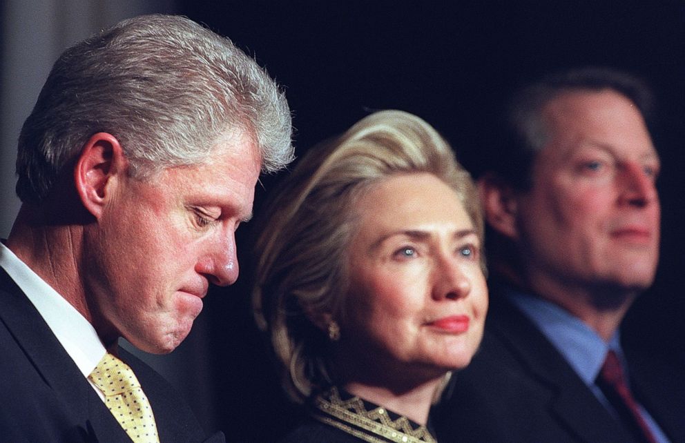 PHOTO: President Bill Clinton, first lady Hillary and Vice President Al Gore listen to speeches at a Democratic National Committee dinner after the Senate completed its second day of the impeachment trial of President Clinton in Washington, Jan. 15, 1999.