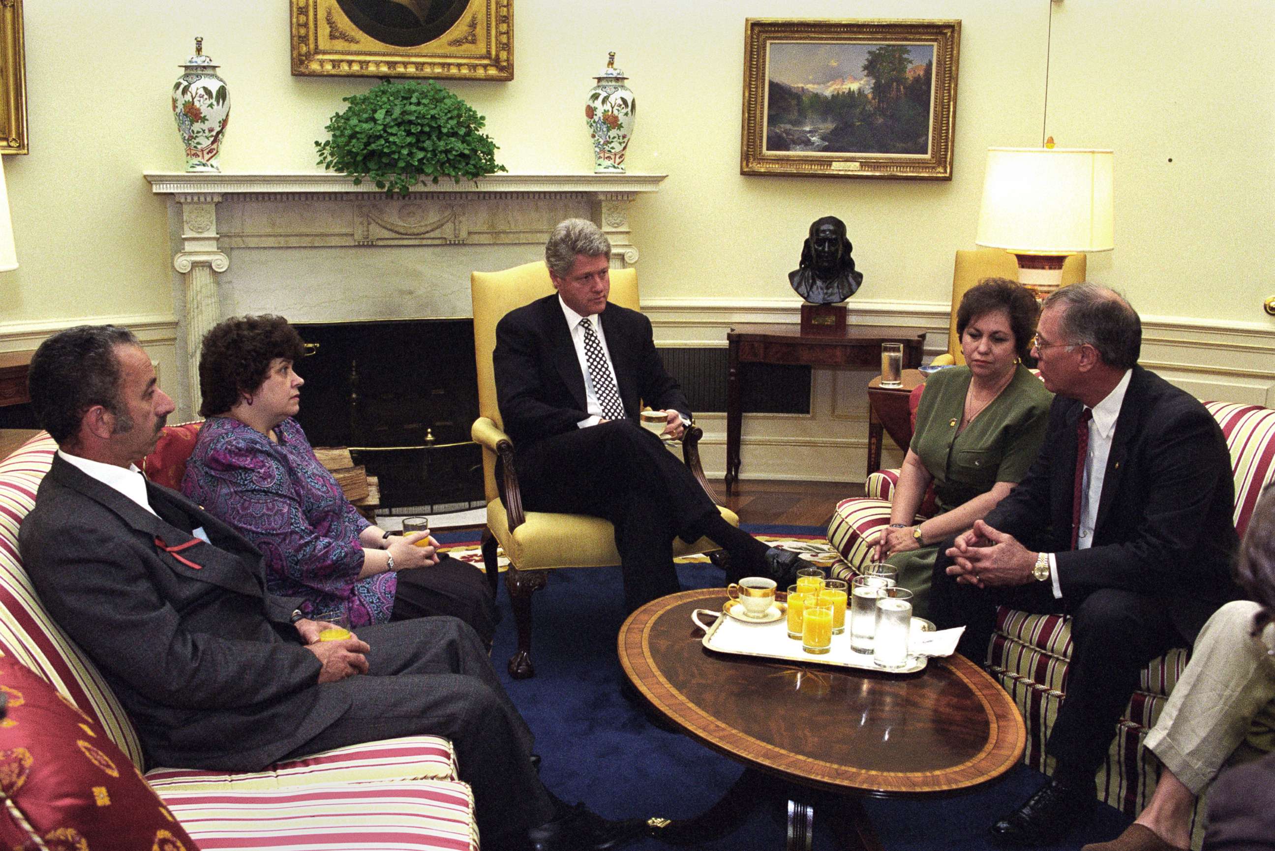 PHOTO: President Clinton meets with James and Caroline Smith and Gail and Larry Joyce in the Oval Office, May 12, 1994. Their sons died after two helicopters were shot down in a mission in Somalia in 1993.