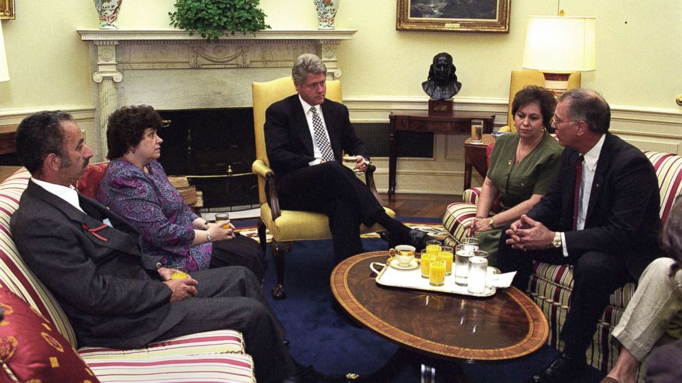 PHOTO: President Clinton meets with James and Caroline Smith and Gail and Larry Joyce in the Oval Office, May 12, 1994. Their sons died after two helicopters were shot down in a mission in Somalia in 1993.