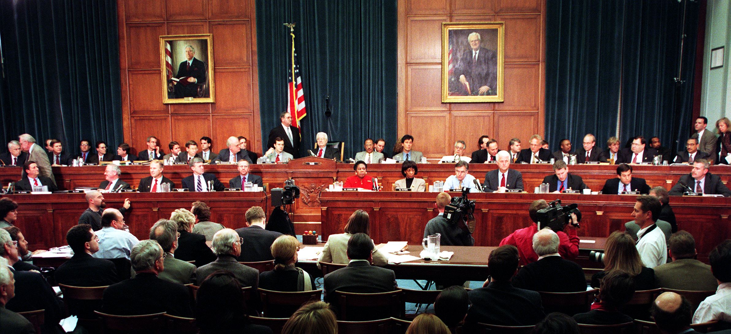 PHOTO: Members of the House Judiciary Committee discuss articles of impeachment against US President Bill Clinton Dec. 11, 1998, on Capitol Hill in Washington, DC.