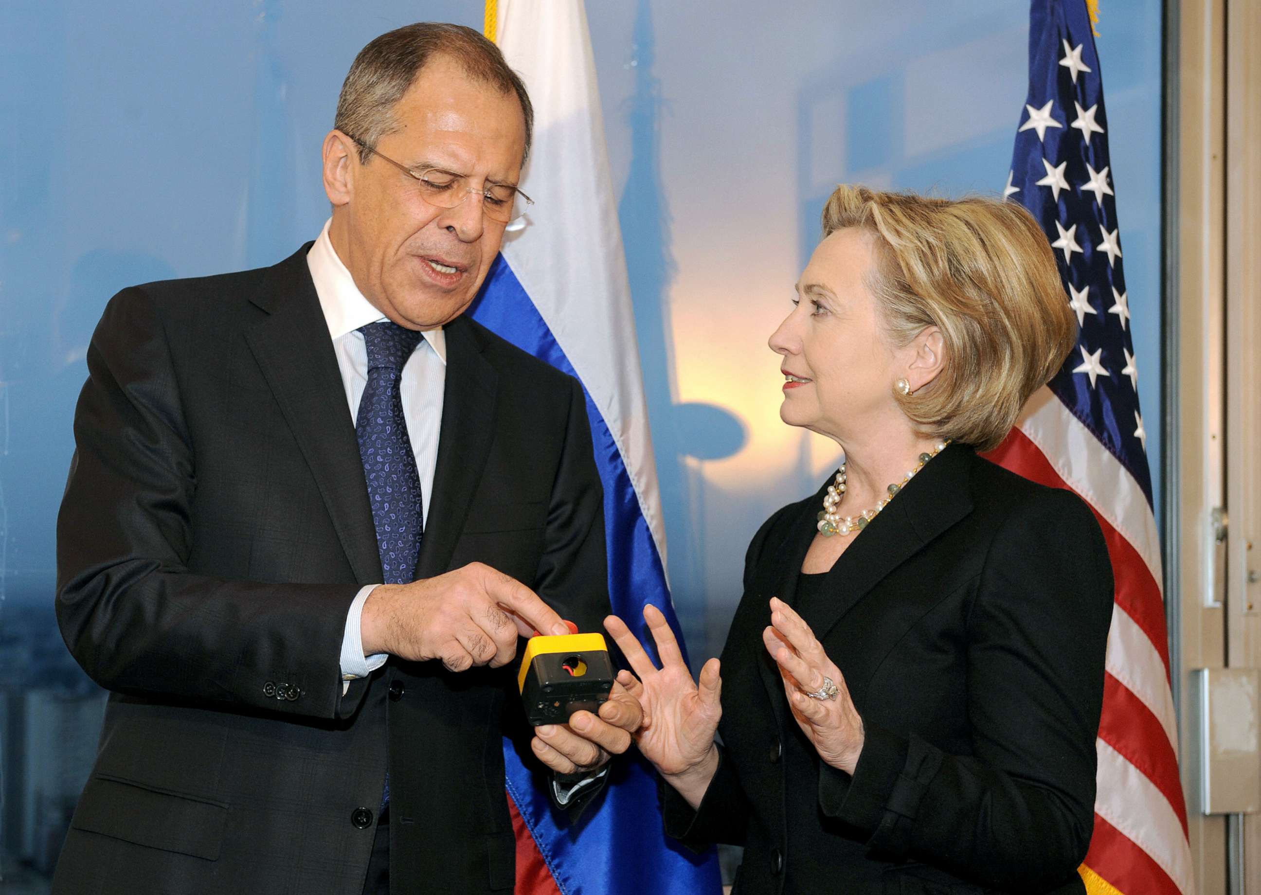 PHOTO: Secretary of State Hillary Clinton with Russian Foreign Minister Sergei Lavrov, after she gave him a device with red knob, during a meeting, March 6, 2009, in Geneva.