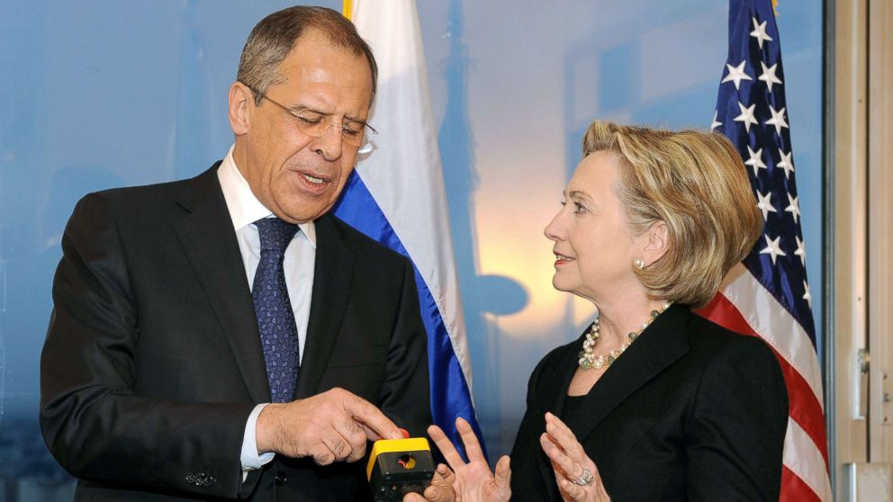 Secretary of State Hillary Clinton with Russian Foreign Minister Sergei Lavrov, after she gave him a device with red knob, during a meeting, March 6, 2009, in Geneva.