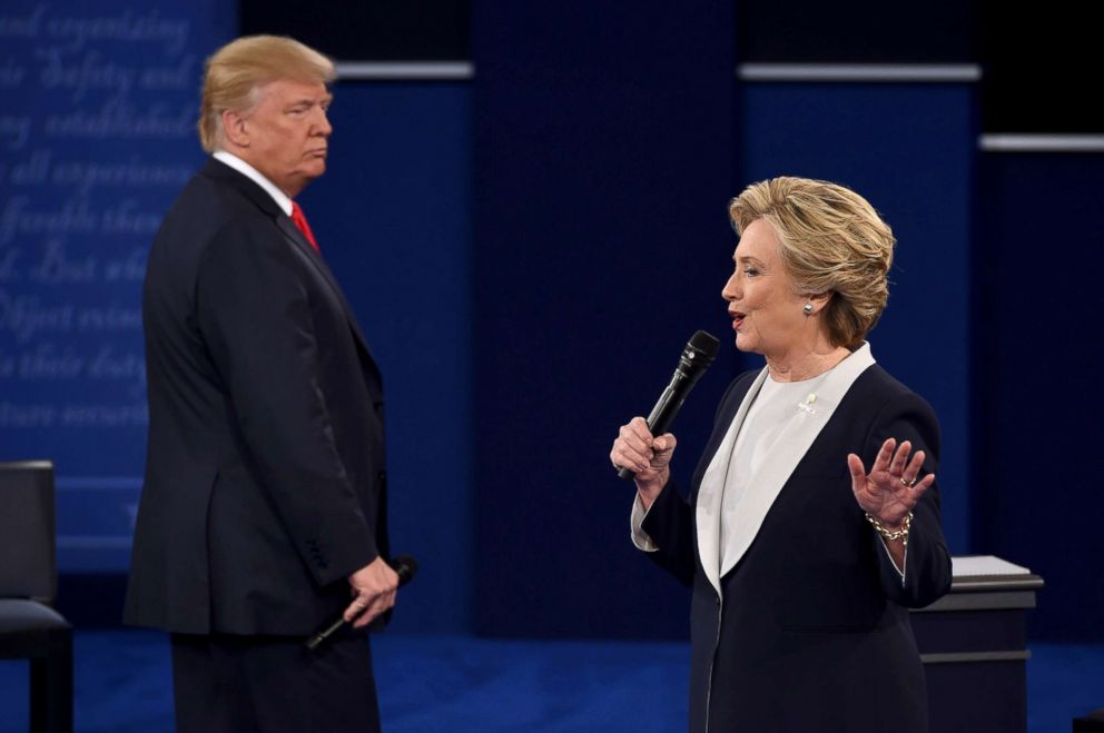 PHOTO: Democratic presidential candidate Hillary Clinton speaks, as Republican presidential candidate Donald Trump listens, during the second presidential debate at Washington University in St. Louis, Oct. 9, 2016.