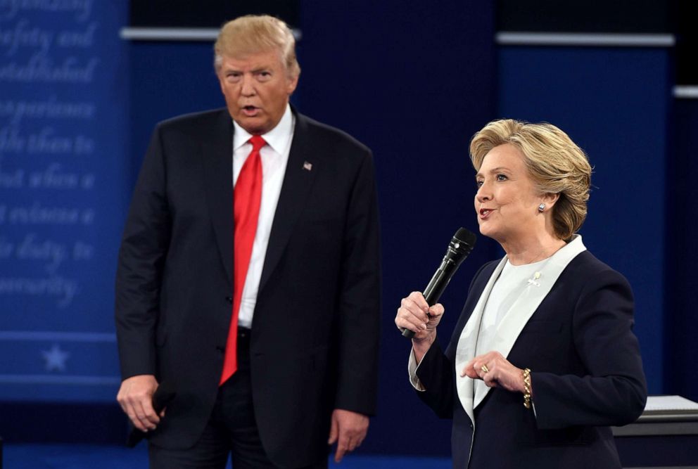 PHOTO: Democratic presidential candidate Hillary Clinton and Republican presidential candidate Donald Trump debate during the second presidential debate at Washington University in St. Louis, Missouri, Oct. 9, 2016.