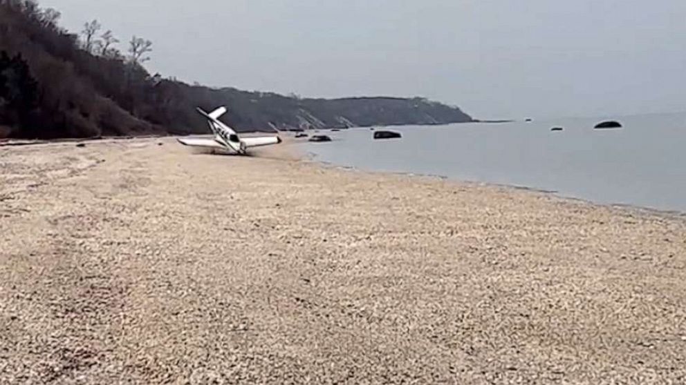 PHOTO: A single-engine plane piloted by N.Y. Assemblyman Clyde Vanel made an emergency landing on the beach in Shoreham, New York, due to a reported engine issue, on March 17, 2023.