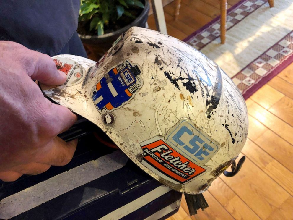 PHOTO: A retired coal miner displays his mining helmet at his home in Coeburn, Va., Jan. 24, 2019. 