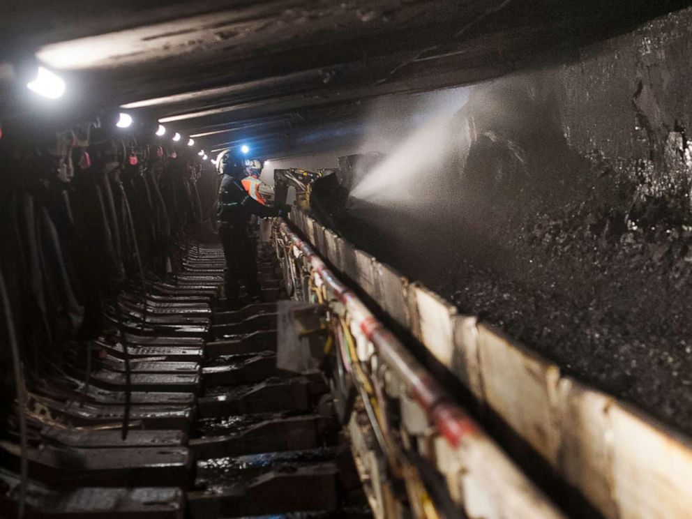 PHOTO:A coal miner works in a longwall mining tunnel at the Consol Energy Bailey Mine in Wind Ridge, Pa., May 14, 2013.