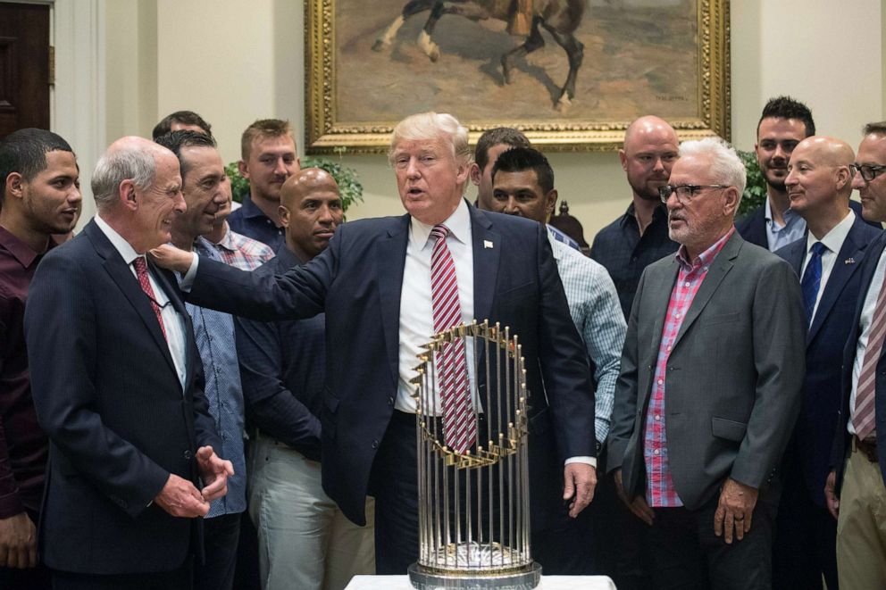 PHOTO:President Donald Trump speaks with Director of National Intelligence Dan Coats as he meets with members of the Chicago Cubs baseball team in the Roosevelt Room at the White House, June 28, 2017.