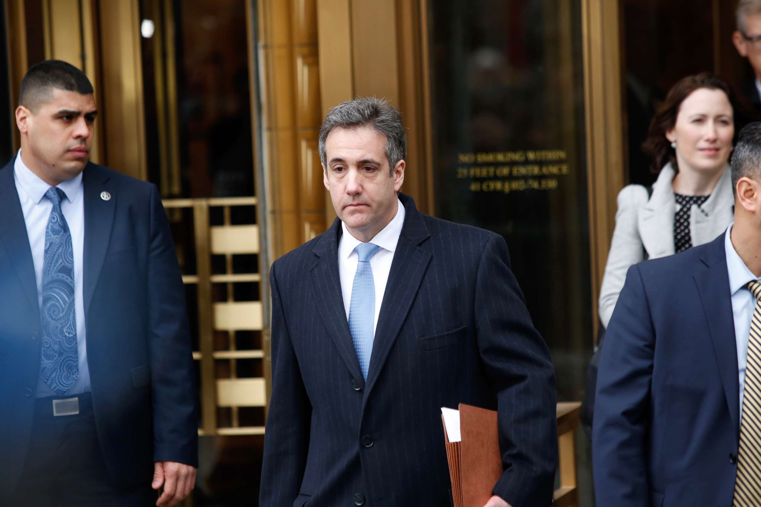 PHOTO: Michael Cohen, President Donald Trump's former personal attorney exits federal court after his sentencing hearing, Dec. 12, 2018, in New York.