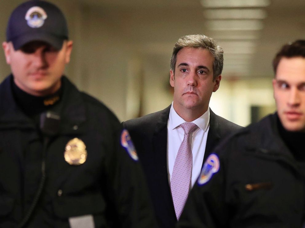 PHOTO: Michael Cohen, President Donald Trumps former lawyer, back center, leaves after a closed door Senate Intelligence Committee hearing on Capitol Hill, Feb. 26, 2019.