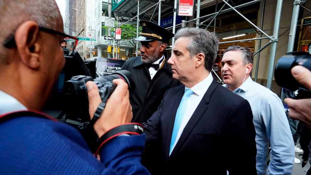 PHOTO: Former Trump attorney, Michael Cohen (C), departs his home for Manhattan Criminal Court for the trial of former President Donald Trump in New York City, on May 14, 2024.