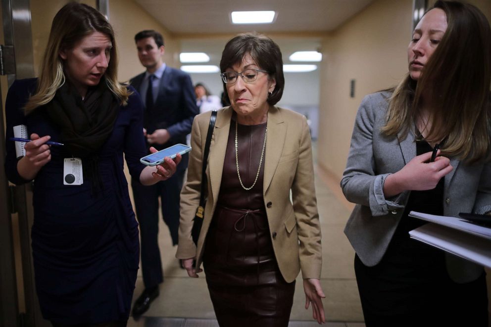 PHOTO: Sen. Susan Collins (R-ME) talks to reporters as she heads to the Capitol for the weekly Republican policy luncheon, March 5, 2019.