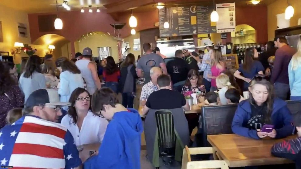 PHOTO: Crowd of people are seen at the C&C in Castle Rock restaurant, celebrating Mother's Day amid the coronavirus disease (COVID-19) outbreak, in Castle Rock, Colo., May 10, 2020. 