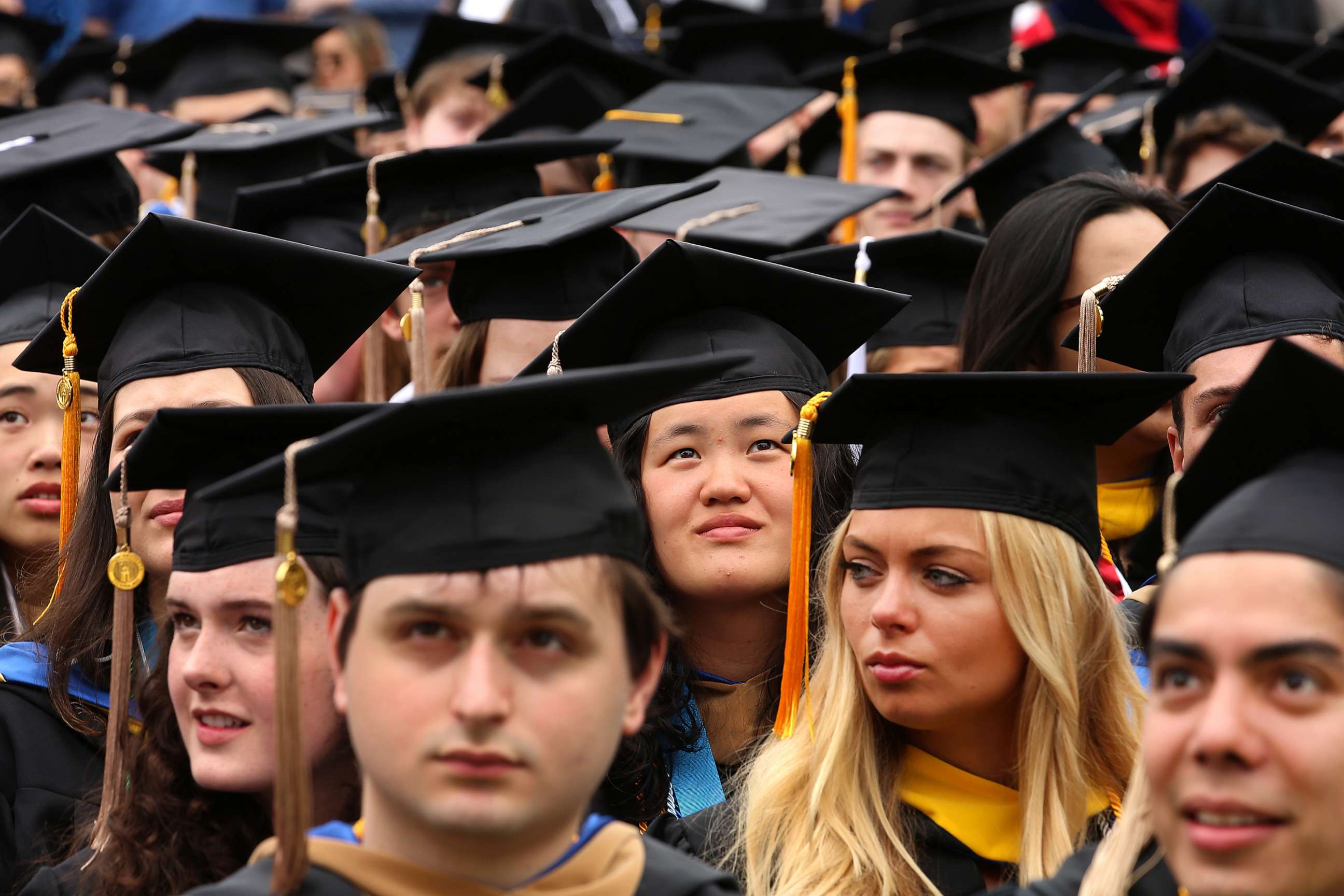 PHOTO: Bentley University graduates listen to the commencement ceremony in Waltham, May, May 20, 2023.