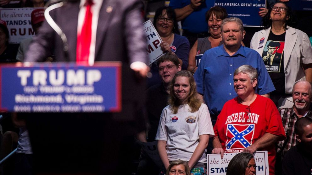 PHOTO: A man wears a shirt with a confederate flag on it as Republican Presidential candidate Donald Trump speaks during a rally at the Richmond Coliseum in Richmond, Va., June 10, 2016. 