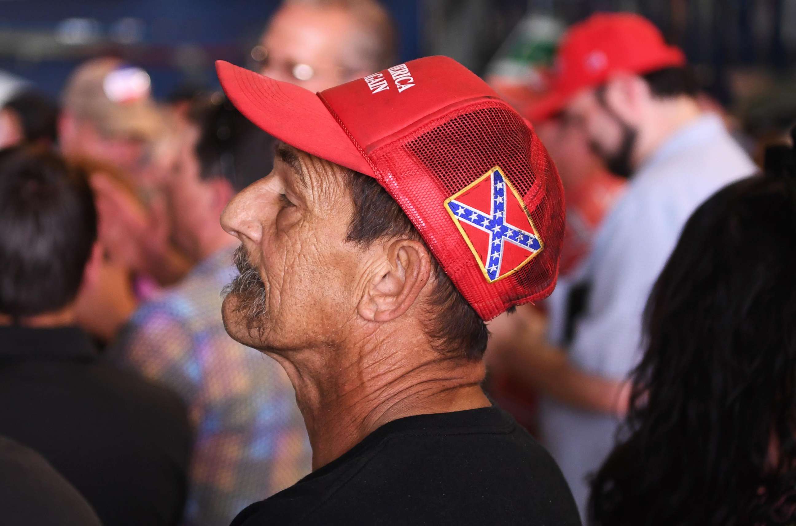 PHOTO: A man has a confederate flag on his "Make America Great" hat during a Donald Trump rally at the Wings Over the Rockies Museum in Denver, July 29, 2016. 