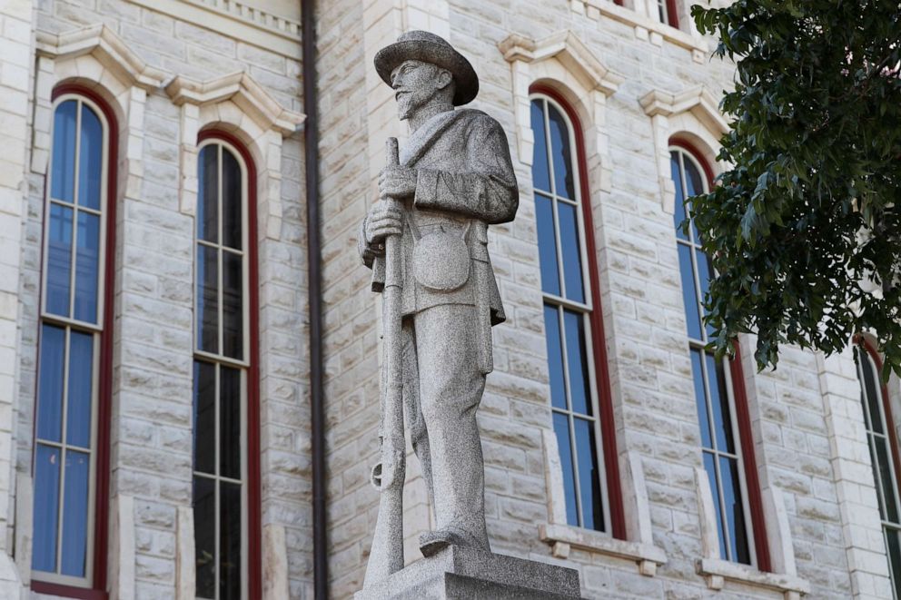 PHOTO: A statue of a Confederate soldier sits outside the Parker County Courthouse in Weatherford, Texas, Friday, July 31, 2020. 