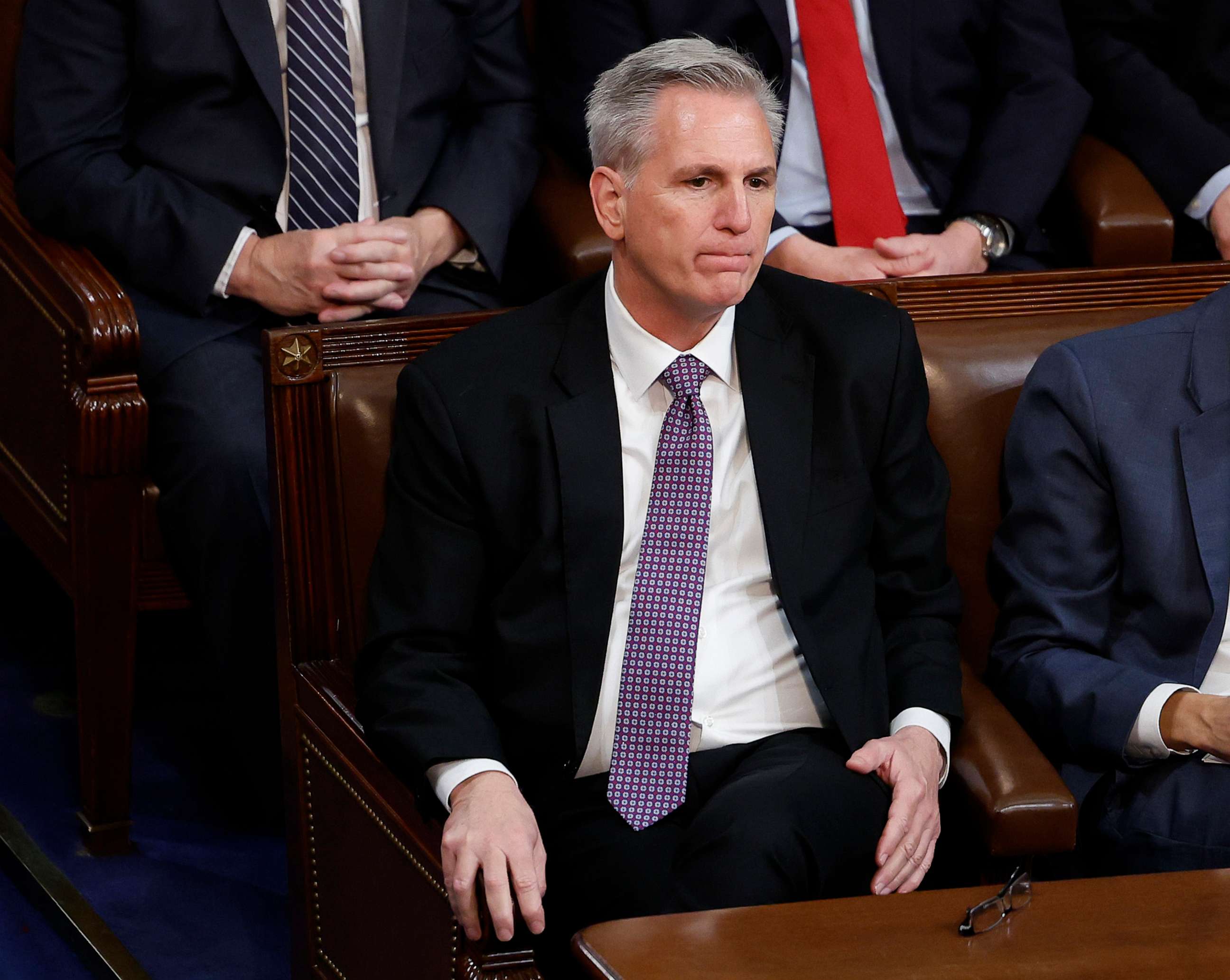 PHOTO: House Republican Leader Kevin McCarthy listens in the House Chamber during the second day of elections for Speaker of the House at the U.S. Capitol Jan. 4, 2023, in Washington.