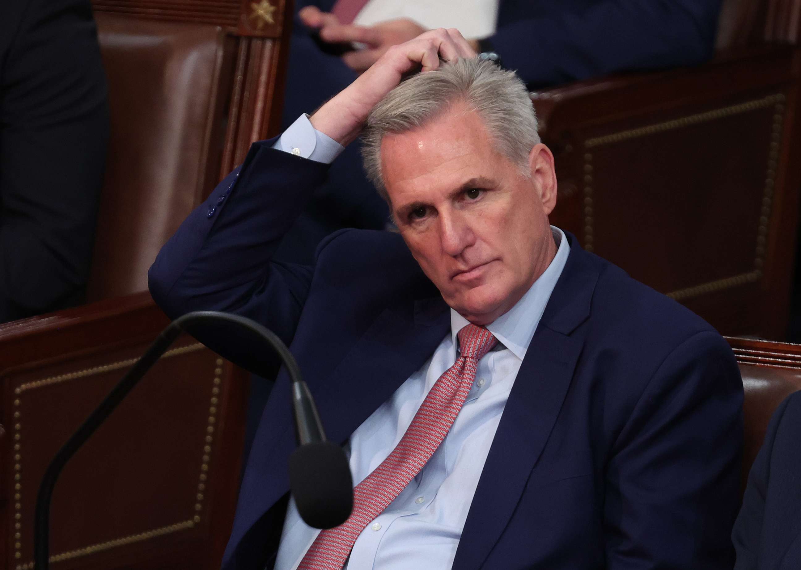 PHOTO: House Minority Leader Kevin McCarthy listens as Representatives cast their votes for Speaker of the House on the first day of the 118th Congress in the House Chamber of the U.S. Capitol, Jan. 3, 2023 in Washington.