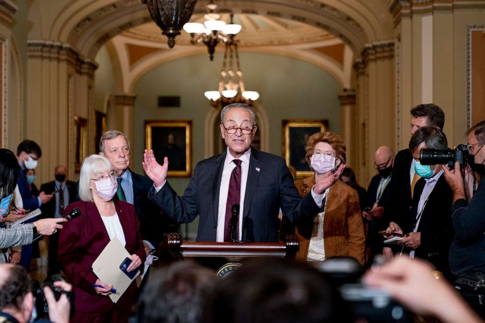 PHOTO: Senate Majority Leader Chuck Schumer speaks to reporters following a Democratic strategy meeting at the Capitol in Washington,  Oct. 19, 2021. 