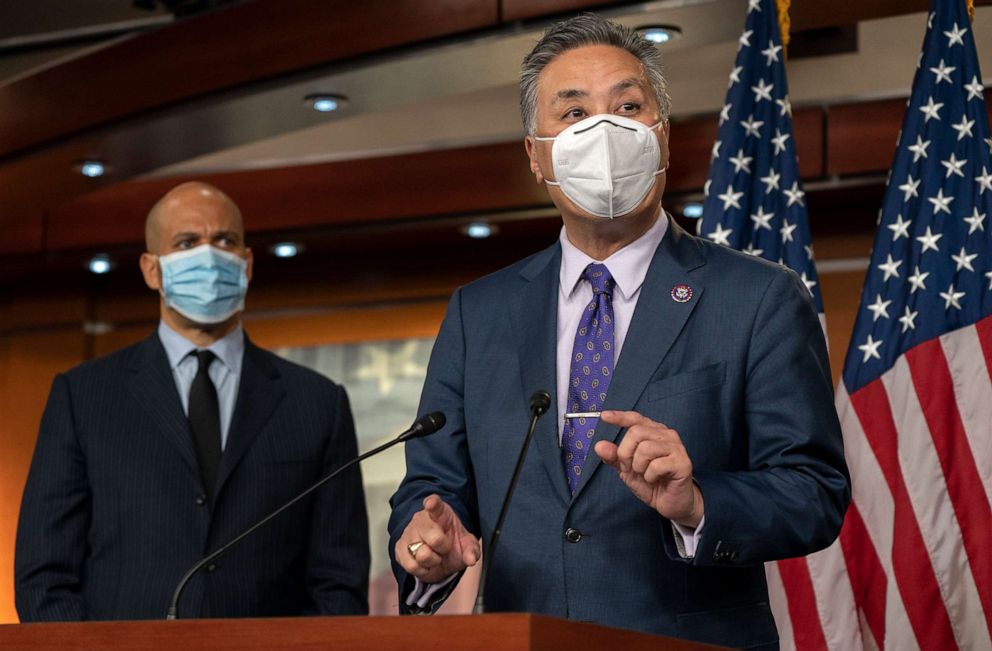 PHOTO: Sen. Cory Bookerwatches as Rep. Mark Takano, D-Calif., speaks about the Congress Equality Act, Feb. 25, 2021, on Capitol Hill.