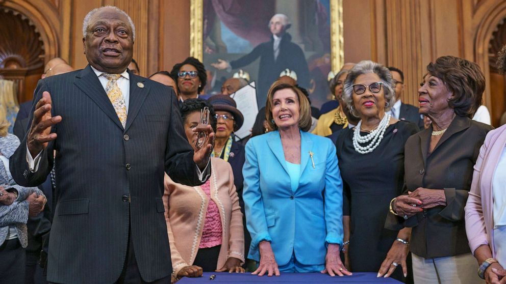 PHOTO: James Clyburn, Nancy Pelosi, Reps. Al Green, Sheila Jackson Lee, Joyce Beatty, Maxine Waters, Barbara Lee and Congressional Black Caucus members celebrate the passage of the Juneteenth National Independence Day Act, June 17, 2021 in Washington.