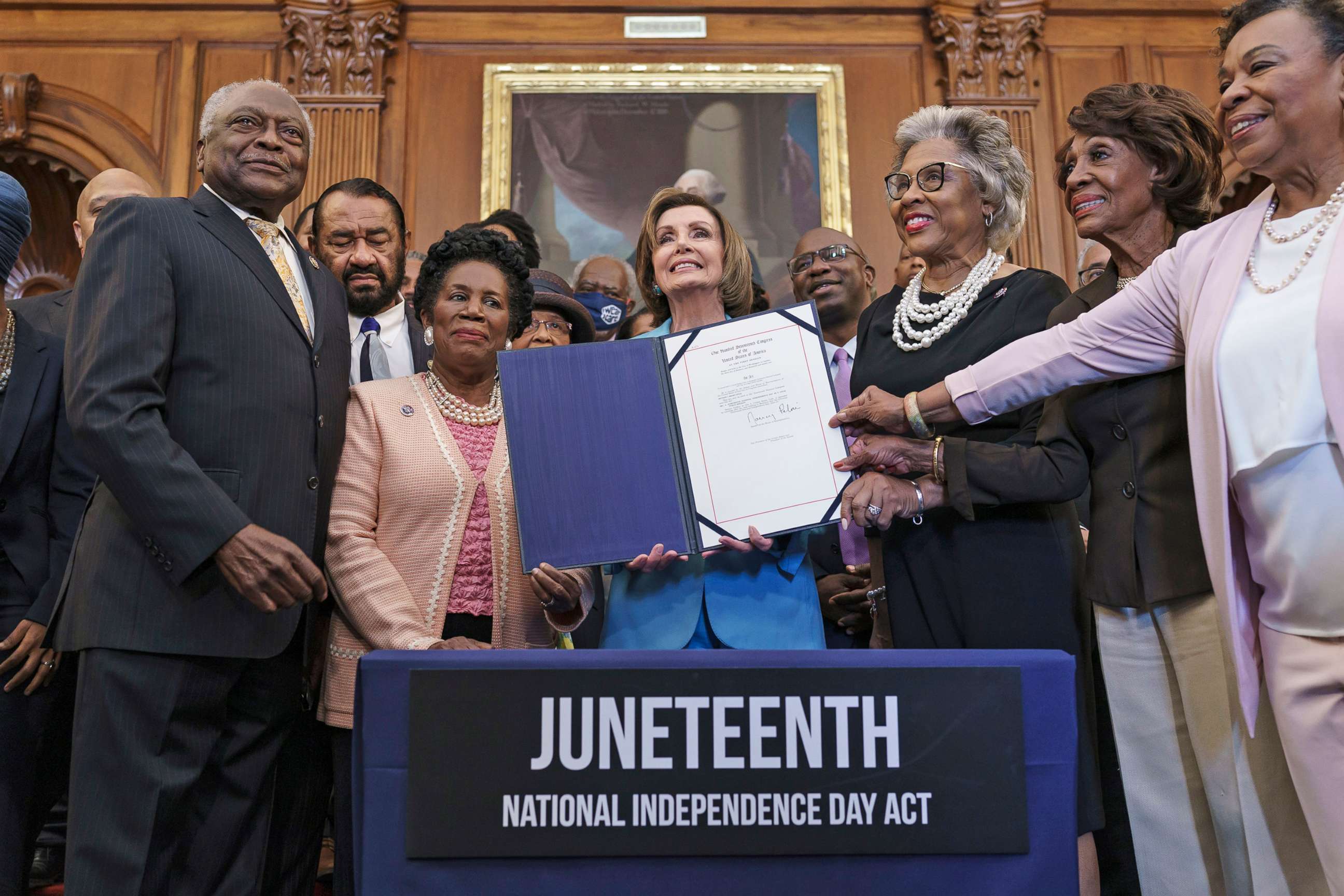 PHOTO: James Clyburn, Nancy Pelosi, Reps. Al Green, Sheila Jackson Lee, Joyce Beatty, Maxine Waters, Barbara Lee and Congressional Black Caucus members celebrate the passage of the Juneteenth National Independence Day Act, June 17, 2021 in Washington.