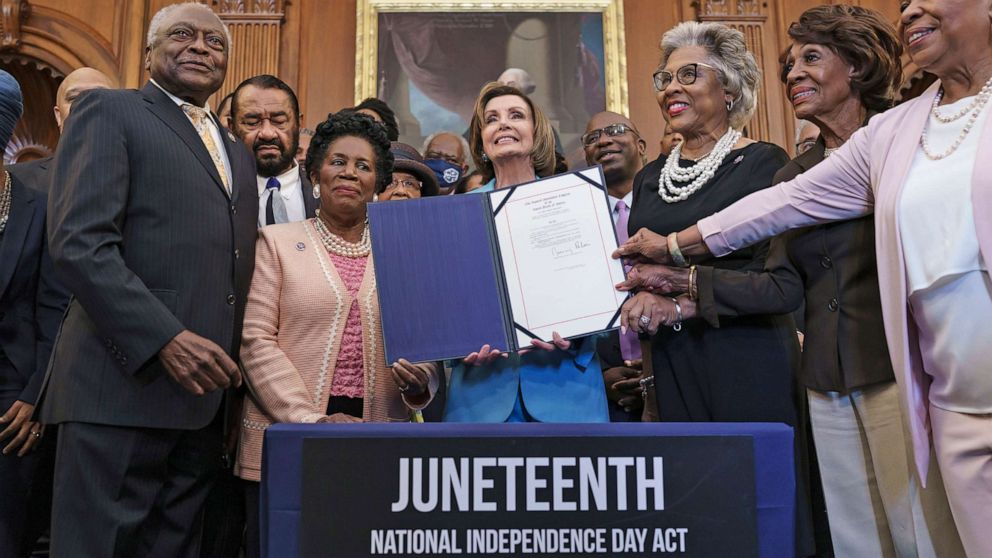 PHOTO: James Clyburn, Nancy Pelosi, Reps. Al Green, Sheila Jackson Lee, Joyce Beatty, Maxine Waters, Barbara Lee and Congressional Black Caucus members celebrate the passage of the Juneteenth National Independence Day Act, June 17, 2021 in Washington.
