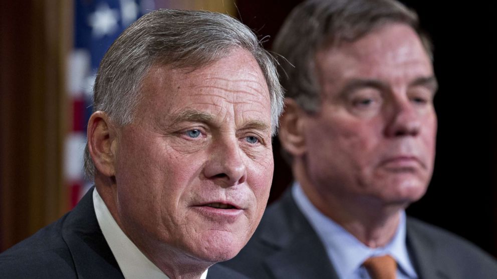 Senator Richard Burr, chairman of the Senate Intelligence Committee, with ranking member Senator Mark Warner during a news conference in Washington, D.C.,Oct. 4, 2017.