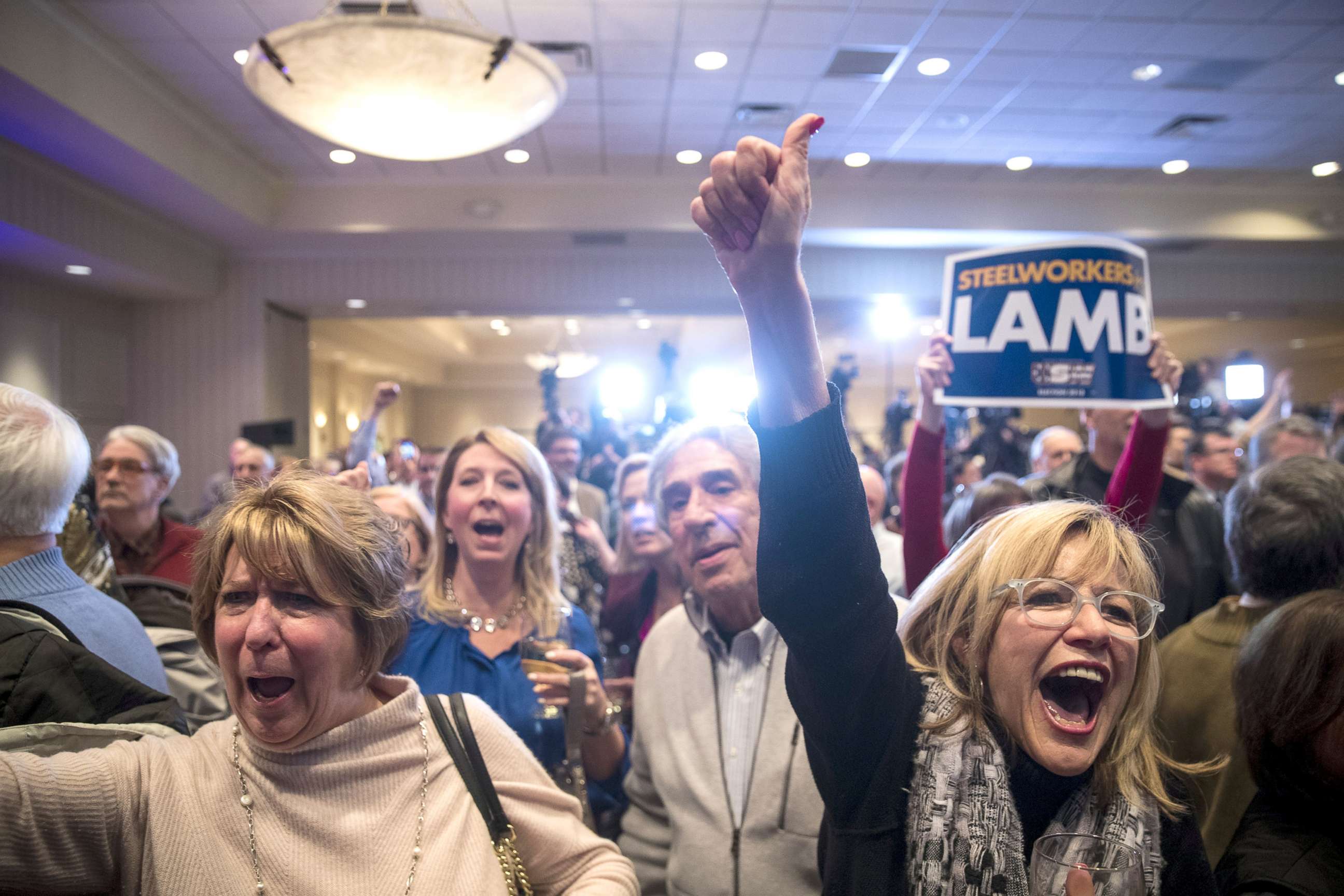PHOTO: Supporters cheer as they watch election returns at an election night event for Conor Lamb,  Democratic congressional candidate for Pennsylvania's 18th district, March 13, 2018 in Canonsburg, Pennsylvania. 