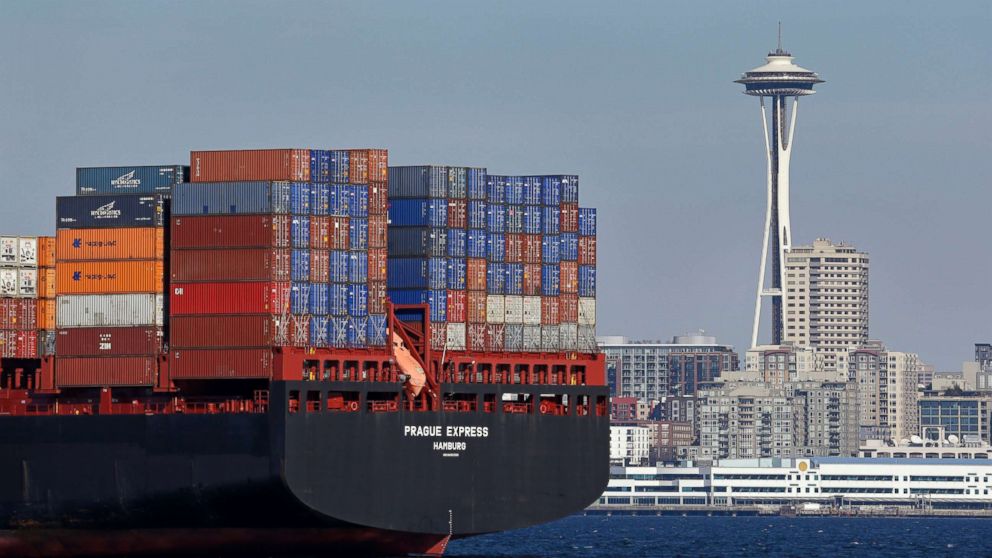 PHOTO: The Space Needle towers in the background beyond a container ship anchored in Elliott Bay near downtown Seattle, Feb. 15, 2015.