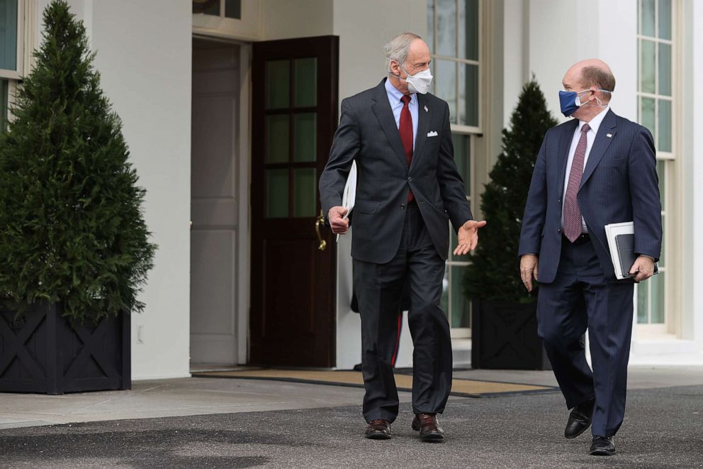 PHOTO: Sen. Tom Carper and Sen. Chris Coons walk out of the West Wing after meeting with President Joe Biden at the White House, Feb. 03, 2021, in Washington.