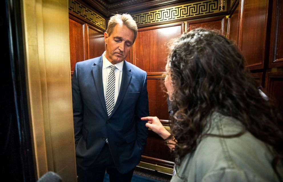PHOTO: A woman who said she is a survivor of a sexual assault confronts Senator Jeff Flake in an elevator.  The woman shouted to Senator Flake 'Look at me when I'm talking to you. You are telling me that my assault doesn't matter.'