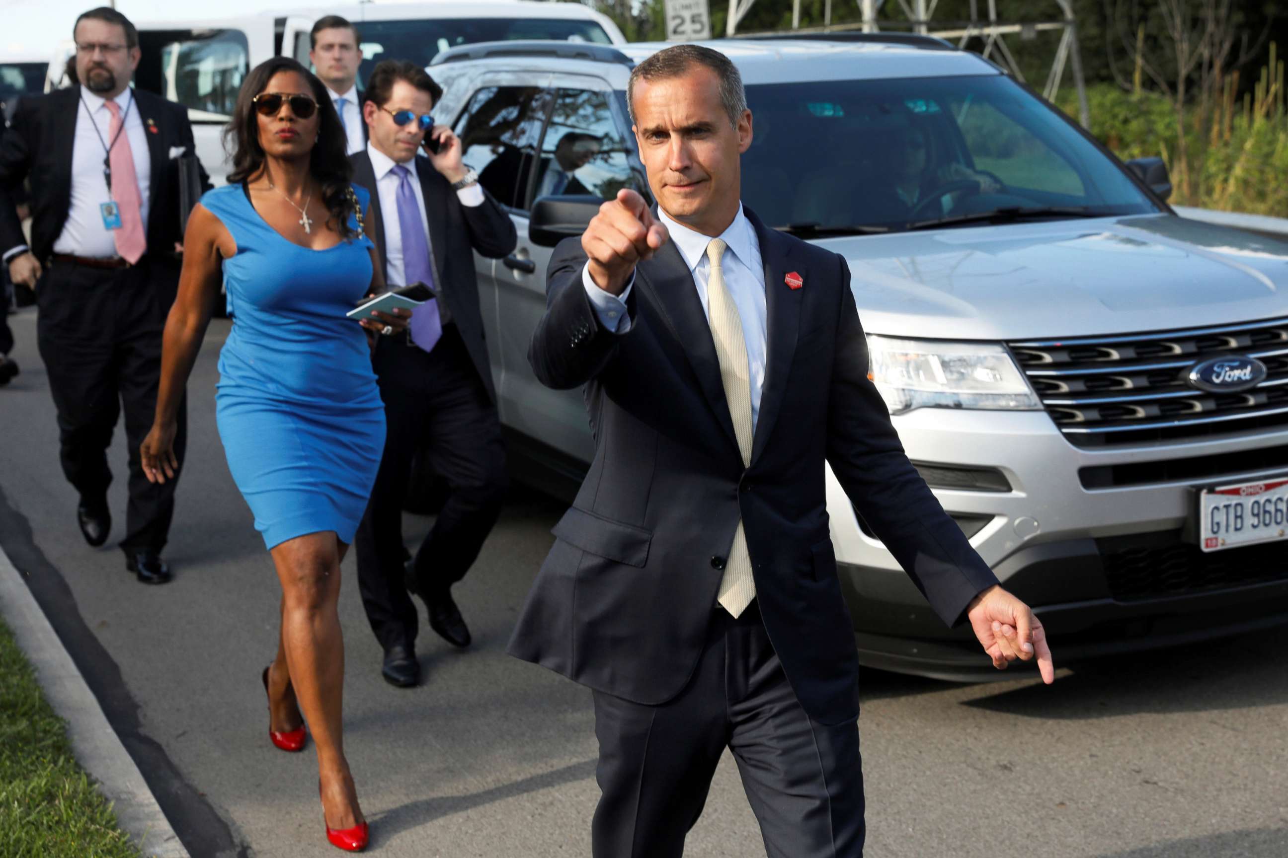 PHOTO: Former campaign manager Corey Lewandowski, right, and White House advisors (L-R) Sebastian Gorka, Omarosa Manigault and Communications Director Anthony Scaramucci accompany President Trump for an event in Struthers, Ohio, July 25, 2017. 