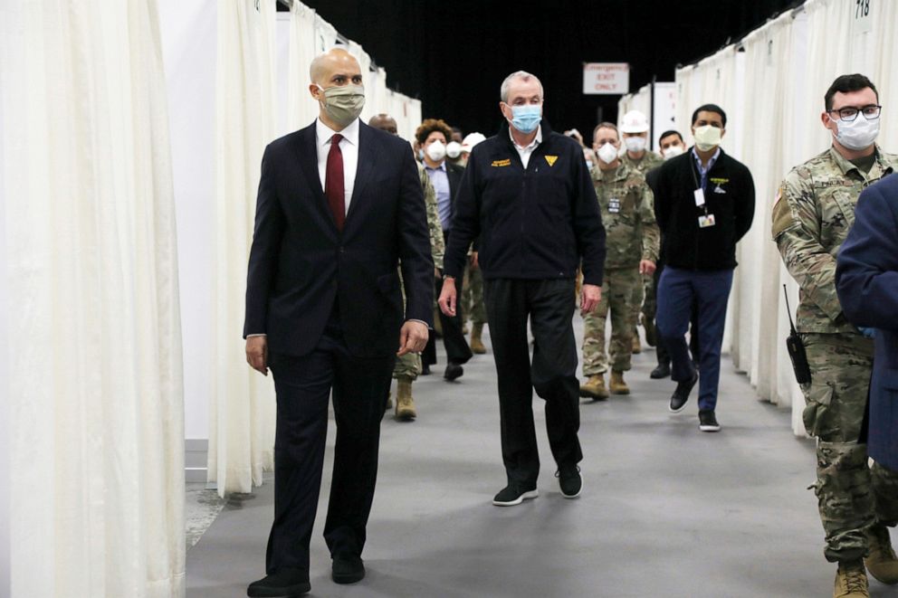 PHOTO: Sen. Cory Booker and New Jersey Gov. Phil Murphy tour the Edison Field Medical Station at the site of the N.J. Convention &amp; Exposition Center in Edison, N.J., April 8, 2020.