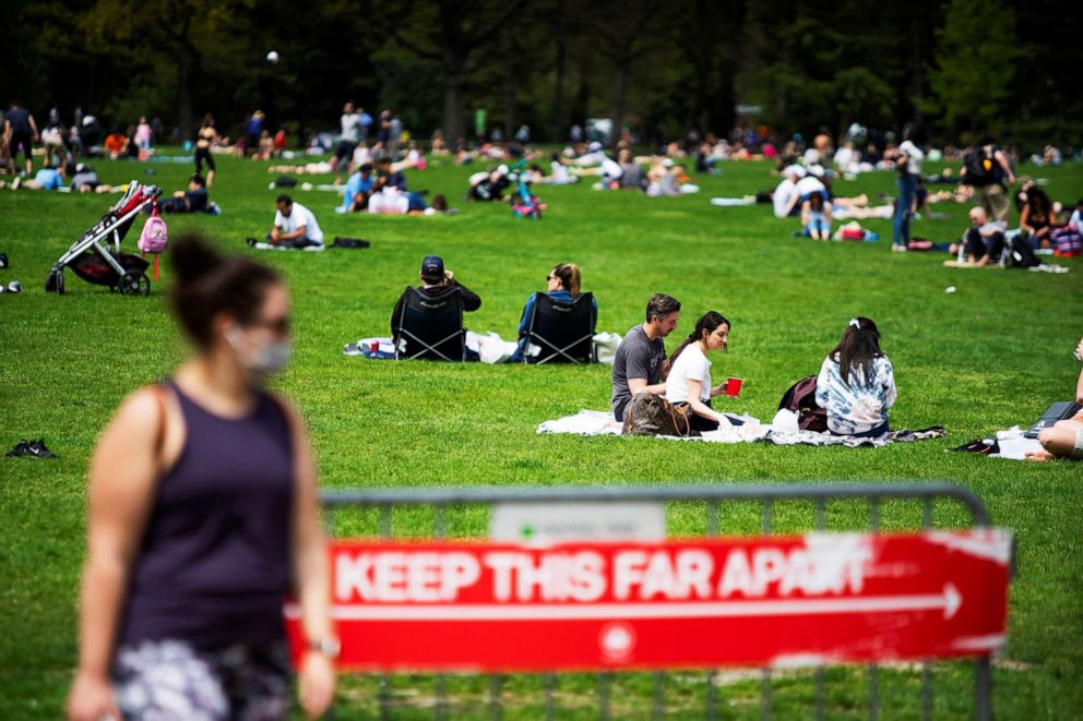 PHOTO: People rest and enjoy the day at Central Park while maintaining social distancing  during the outbreak coronavirus in New York, May 2, 2020. 