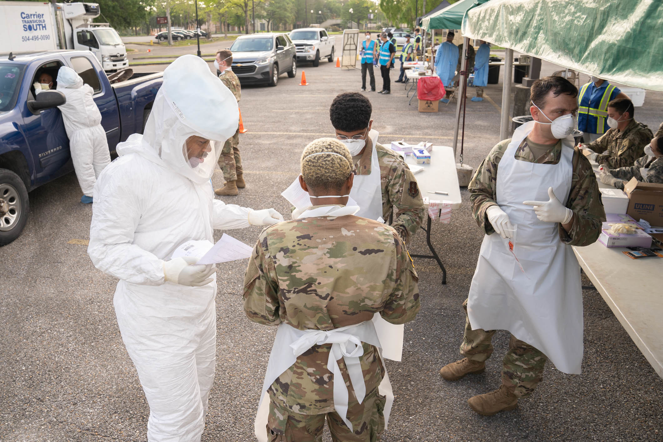 PHOTO: Louisiana National Guard Soldiers and Airmen test first responders for COVID-19 infections at Louis Armstrong Park in New Orleans, March 20, 2020.