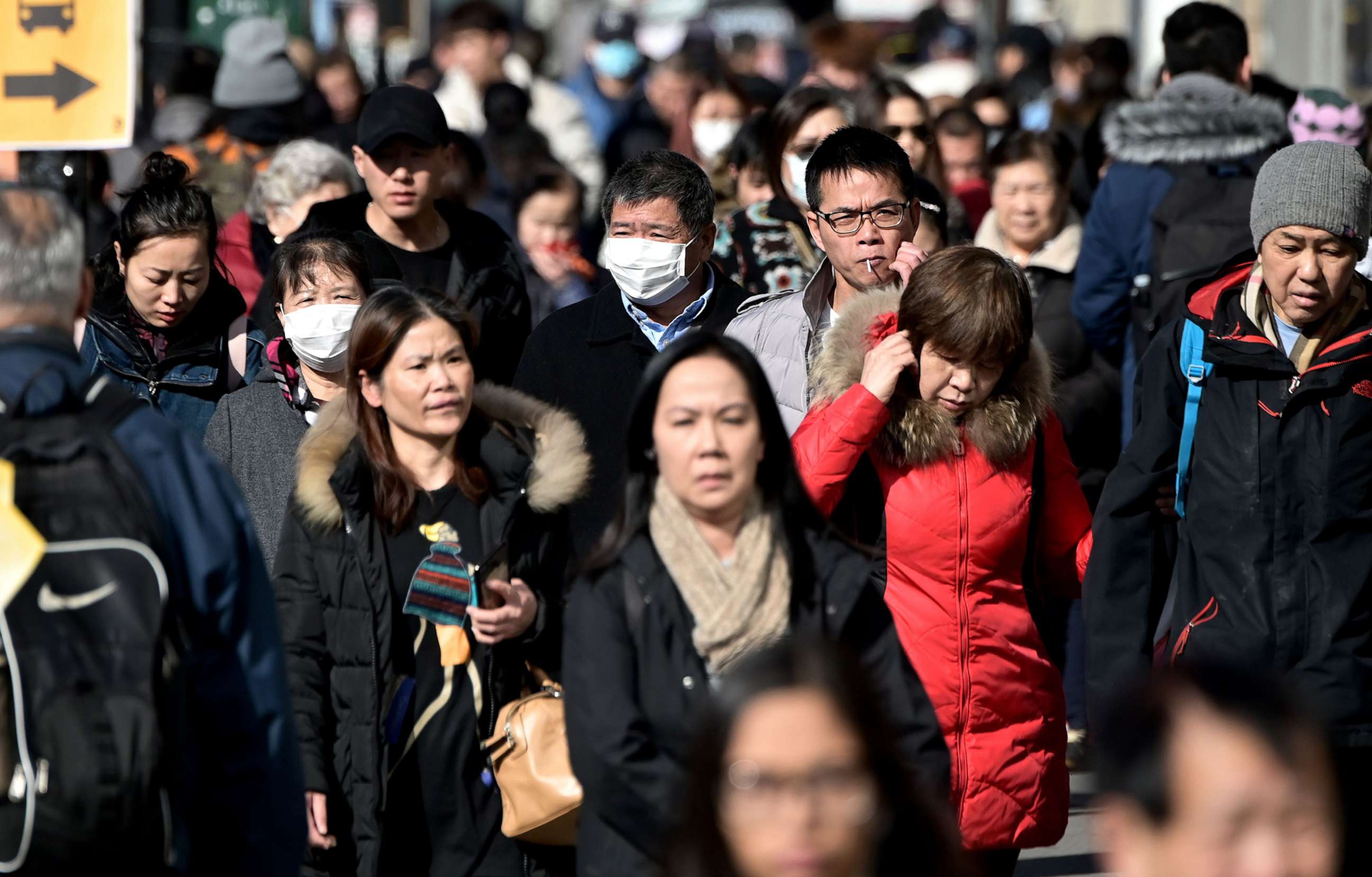 PHOTO: People wear surgical masks in fear of the coronavirus in New York, Feb. 3, 2020.