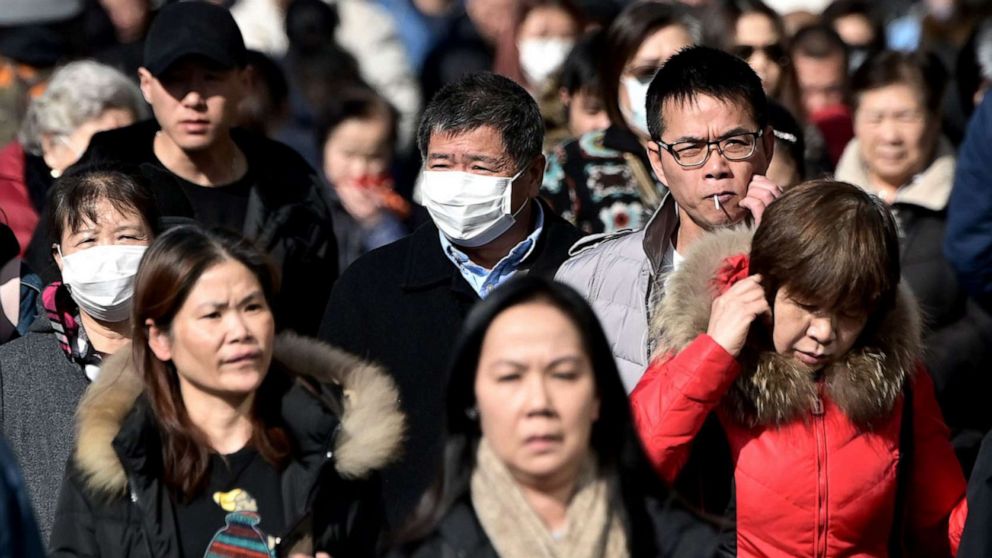 PHOTO: People wear surgical masks in fear of the coronavirus in New York, Feb. 3, 2020.