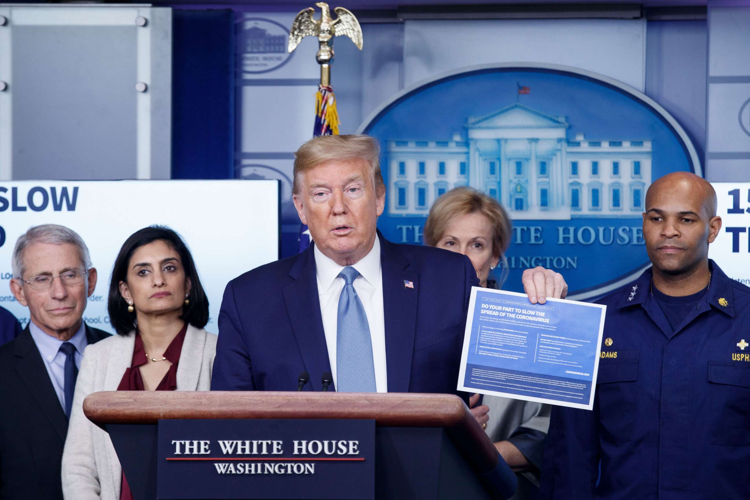 PHOTO: President Donald Trump, with members of the coronavirus task force, delivers remarks during a press briefing at the White House in Washington, March 16, 2020.