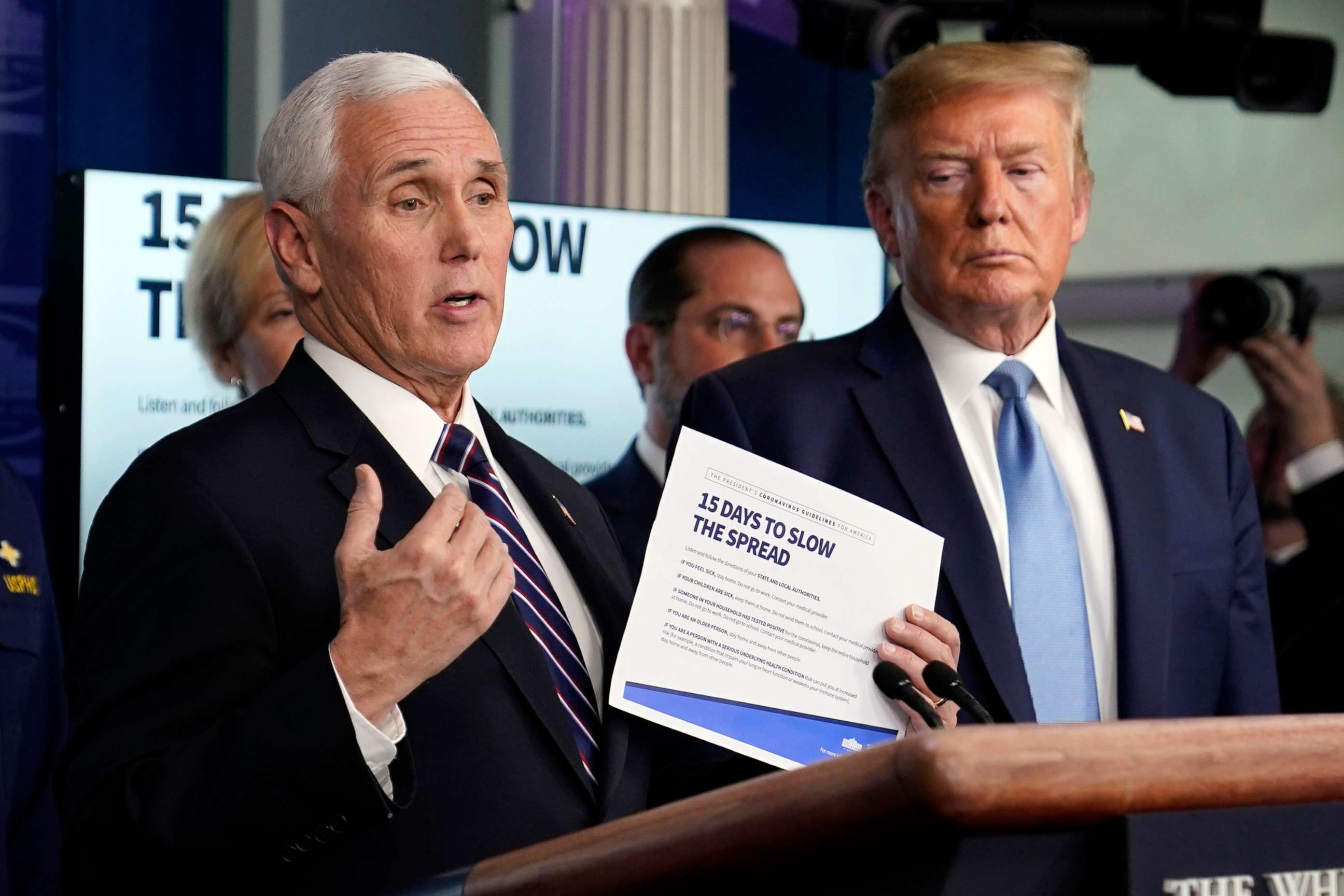 PHOTO: Vice President Mike Pence speaks as President Donald Trump listens during a press briefing with the coronavirus task force, in the Brady press briefing room at the White House, March 16, 2020, in Washington.