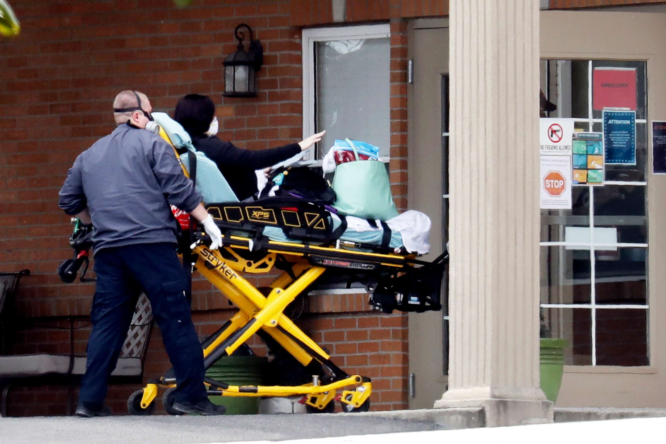 PHOTO: A person is brought into the Gallatin Center for Rehabilitation and Healing, April 3, 2020, in Gallatin, Tenn. Multiple people tested positive for the coronavirus at the facility the previous week.