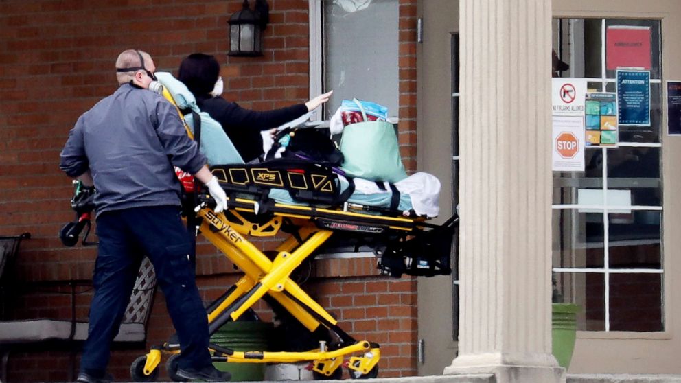 PHOTO: A person is brought into the Gallatin Center for Rehabilitation and Healing, April 3, 2020, in Gallatin, Tenn. Multiple people tested positive for the coronavirus at the facility the previous week.
