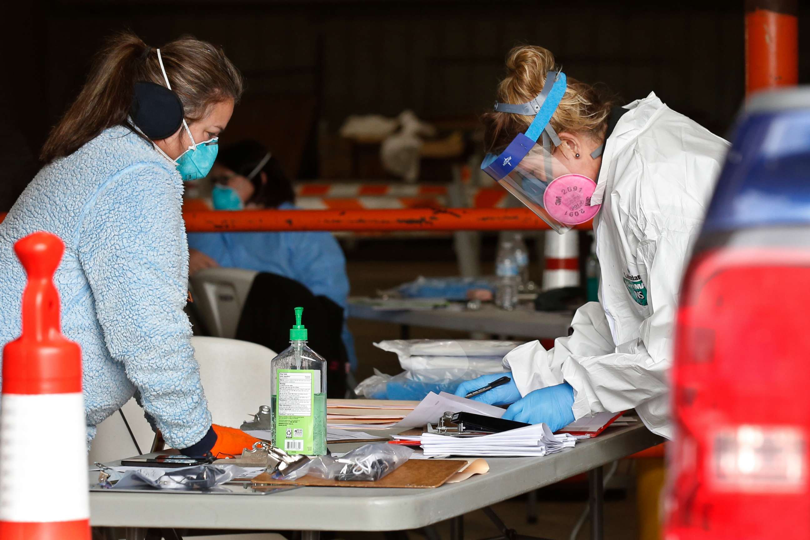 PHOTO: Registered nurses at a mobile testing site for COVID_19 at the Murray County Expo Center in Sulphur, Okla., April 14, 2020. 