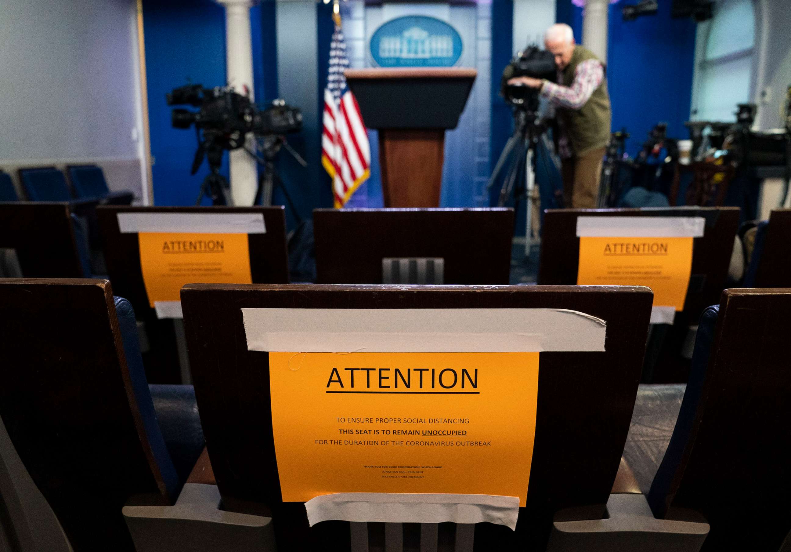 PHOTO: Signs in the briefing room of the White House indicate social distancing measures being taken to separate reporters working at the White House, March 16, 2020, in Washington.