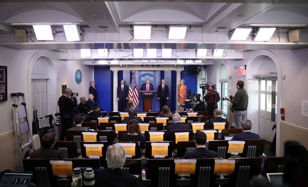 PHOTO: President Donald Trump addresses the daily coronavirus task force briefing as reporters sit in seats marked with novel coronavirus safety warnings and social distancing guidelines at the White House in Washington, April 3, 2020.