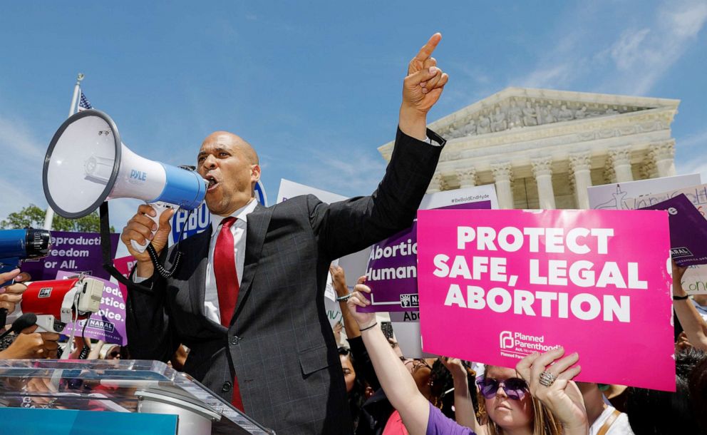 PHOTO: Democratic presidential candidate Sen. Cory Booker addresses abortion rights activists during a rally outside the U.S. Supreme Court in Washington, D.C., May 21, 2019.