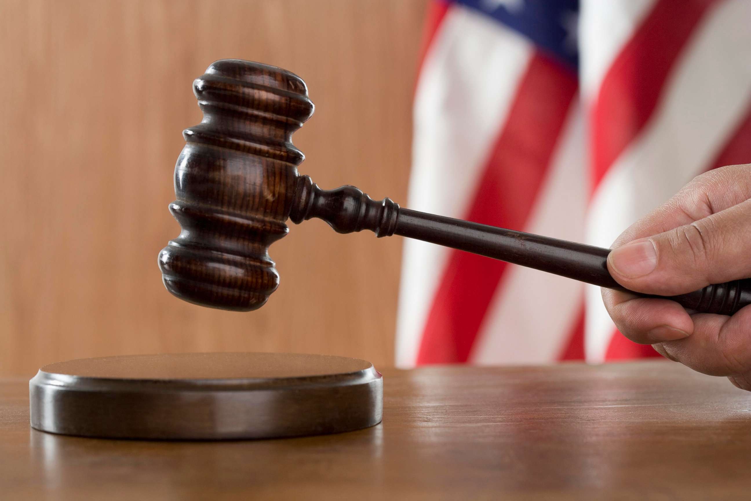 PHOTO: Judge using a gavel in court.