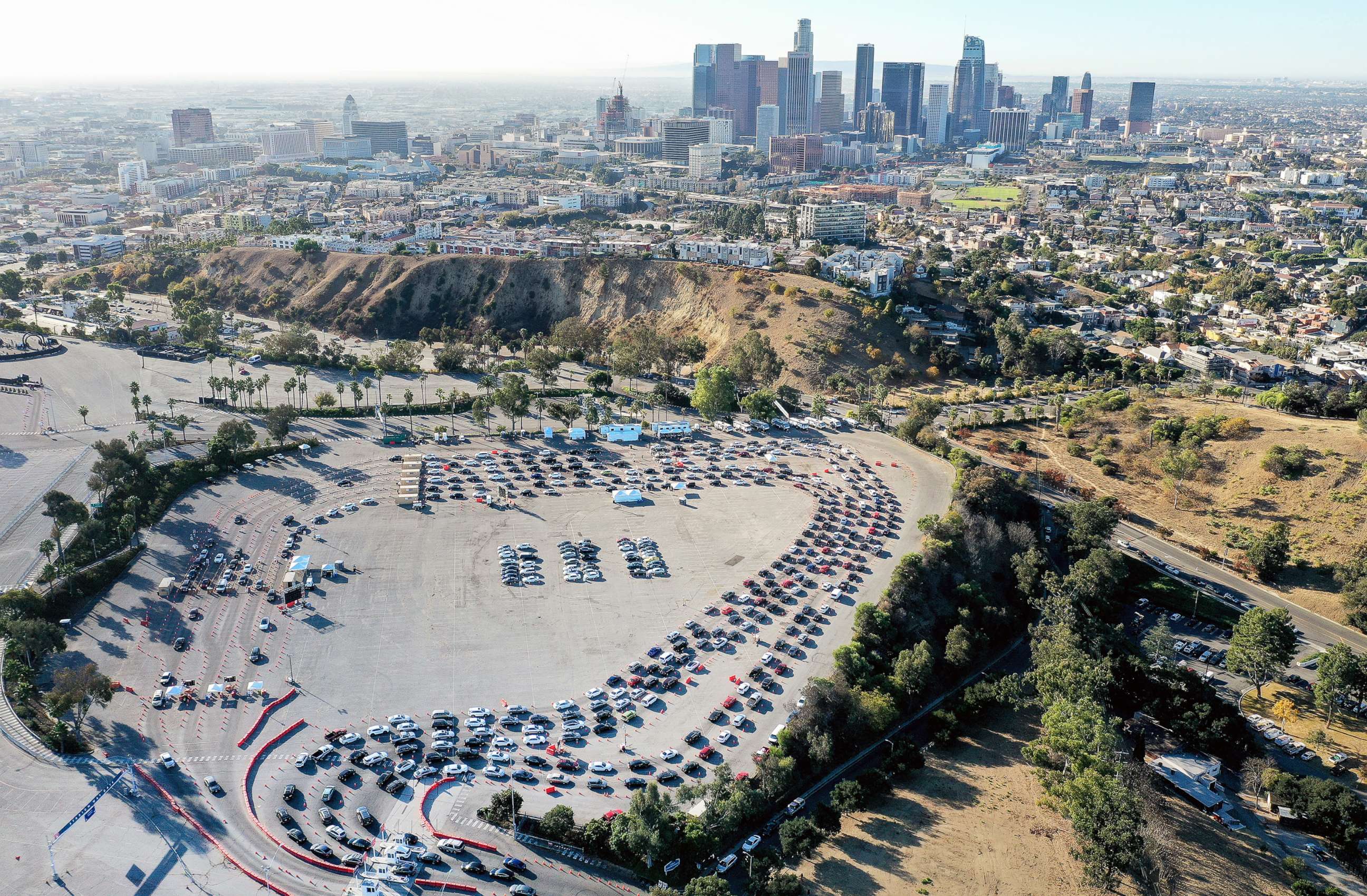 PHOTO: In an aerial view from a drone, cars are lined up at Dodger Stadium for COVID-19 testing, Nov. 30, 2020, in Los Angeles.