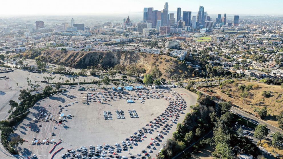 PHOTO: In an aerial view from a drone, cars are lined up at Dodger Stadium for COVID-19 testing, Nov. 30, 2020, in Los Angeles.